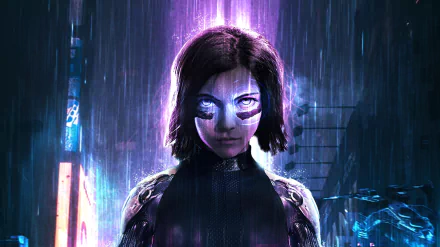 HD PC desktop wallpaper featuring Alita from the movie Alita: Battle Angel, portrayed with glowing eyes and futuristic cybernetic details in a rainy, neon-lit setting.
