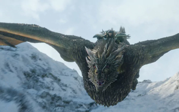 Jon Snow, played by Kit Harington, rides the dragon Rhaegal over snowy mountains in this HD Game of Thrones desktop wallpaper.