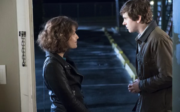 HD wallpaper from The Good Doctor featuring actors Freddie Highmore and Paige Spara in a scene.