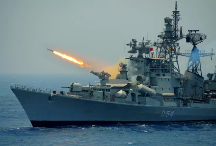 INS Ranvir (D54) Indian Navy destroyer firing a missile at sea — 2K Quad HD warship desktop wallpaper.