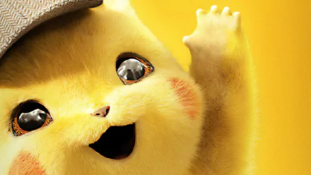 HD desktop wallpaper featuring a close-up of Pikachu from Pokémon Detective Pikachu, waving and smiling, set against a yellow background.