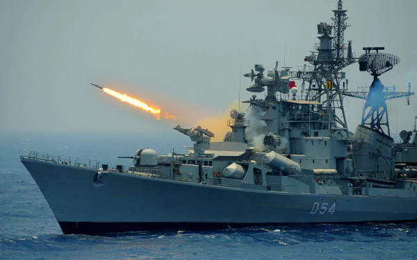 INS Ranvir (D54) Indian Navy destroyer firing a missile at sea — 2K Quad HD warship desktop wallpaper.