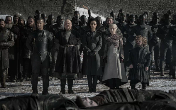 Game of Thrones 2K desktop wallpaper showing Daenerys Targaryen, Tyrion Lannister, Missandei, Lord Varys and Grey Worm standing solemnly before rows of soldiers.