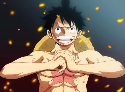 HD desktop wallpaper featuring Monkey D. Luffy from the anime One Piece, with a determined expression surrounded by glowing embers.