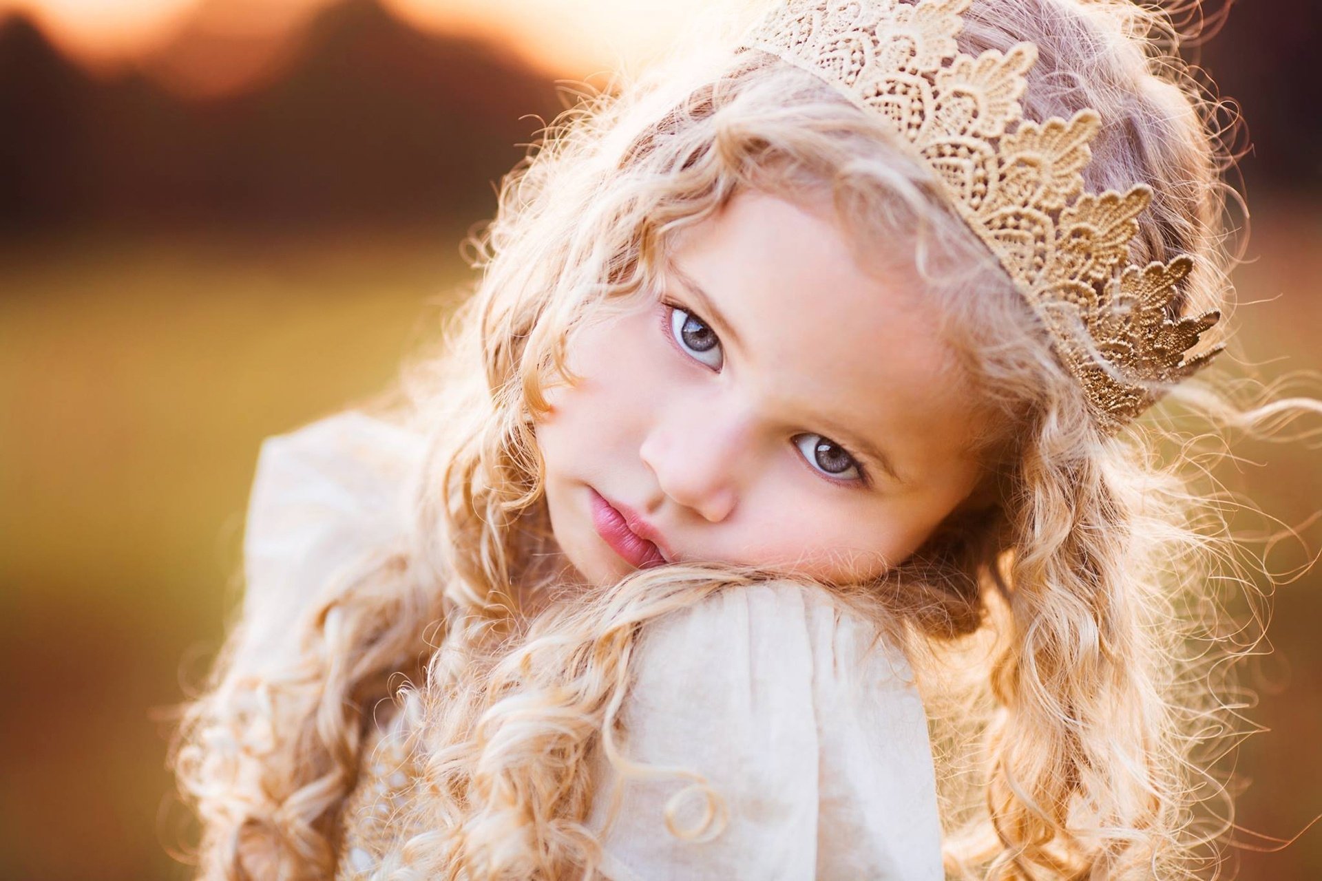 Little Girl with Gold Paper Crown.