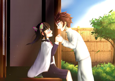 HD PC wallpaper featuring Tanjiro Kamado and Kanao Tsuyuri from the anime Demon Slayer: Kimetsu no Yaiba sharing a tender moment by a sunlit garden fence.