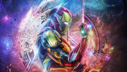 4K Ultra HD PC desktop wallpaper of Iron Man wielding the Infinity Gauntlet in vivid, cosmic Avengers: Endgame movie artwork.