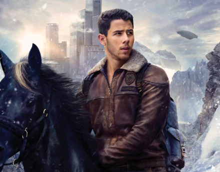 HD PC desktop wallpaper featuring Nick Jonas from the movie Jumanji: The Next Level, dressed in a brown leather jacket, riding a black horse against a dramatic mountainous backdrop.