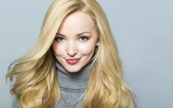 HD desktop wallpaper of Dove Cameron, a blonde celebrity singer and actress, wearing lipstick and a gray turtleneck against a light background.