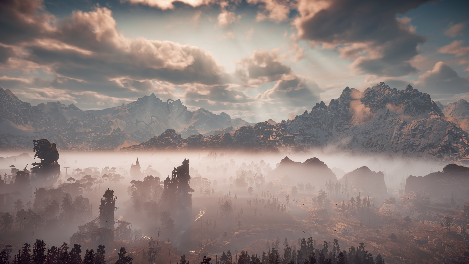 4K Ultra HD PC desktop wallpaper of a foggy, ruined mechanical landscape from the video game Horizon Zero Dawn, sunlit clouds over jagged mountains and mist-shrouded towers.