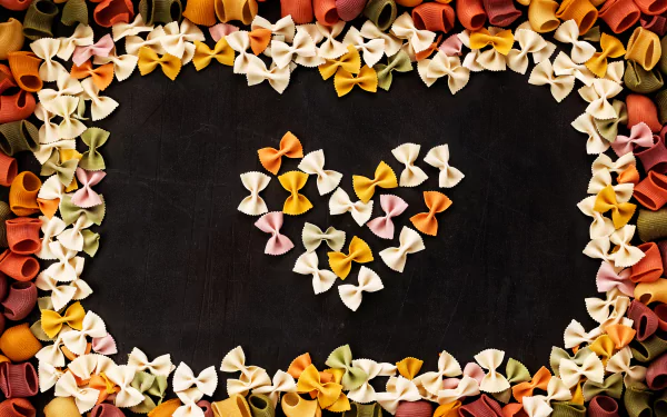  Butterfly (farfalle) pasta arranged in a heart shape