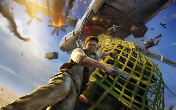 HD wallpaper featuring Nathan Drake from the video game Uncharted 3: Drake's Deception. Drake clings to a cargo net dangling from an aircraft amidst an action-packed scene.