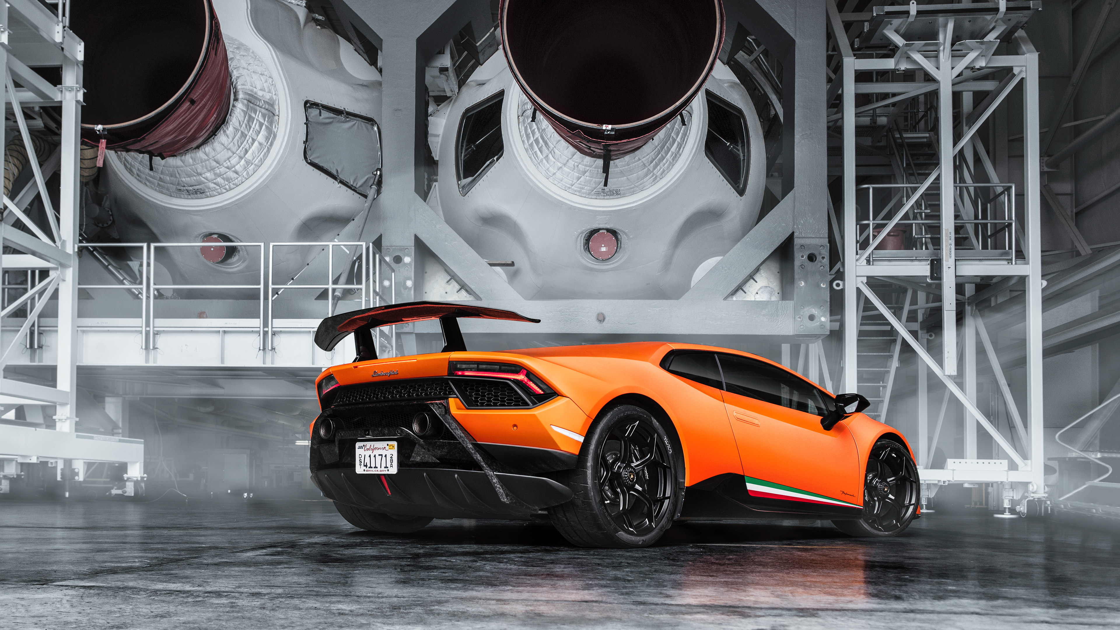 Lamborghini Huracan In Front Of Rocket Engines by Brandon Lim