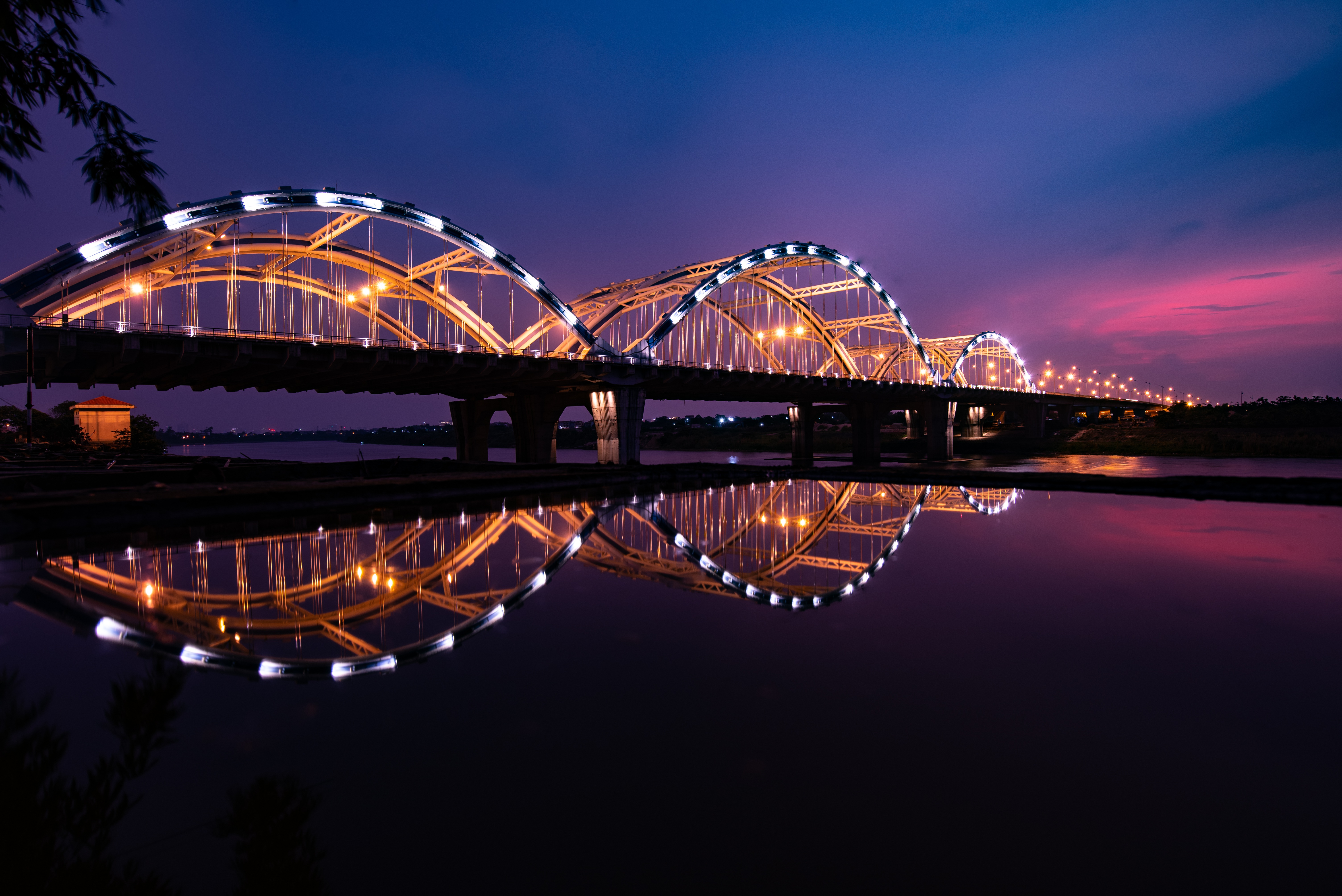 Night Lights Reflected in the Water by Quang Anh Ta