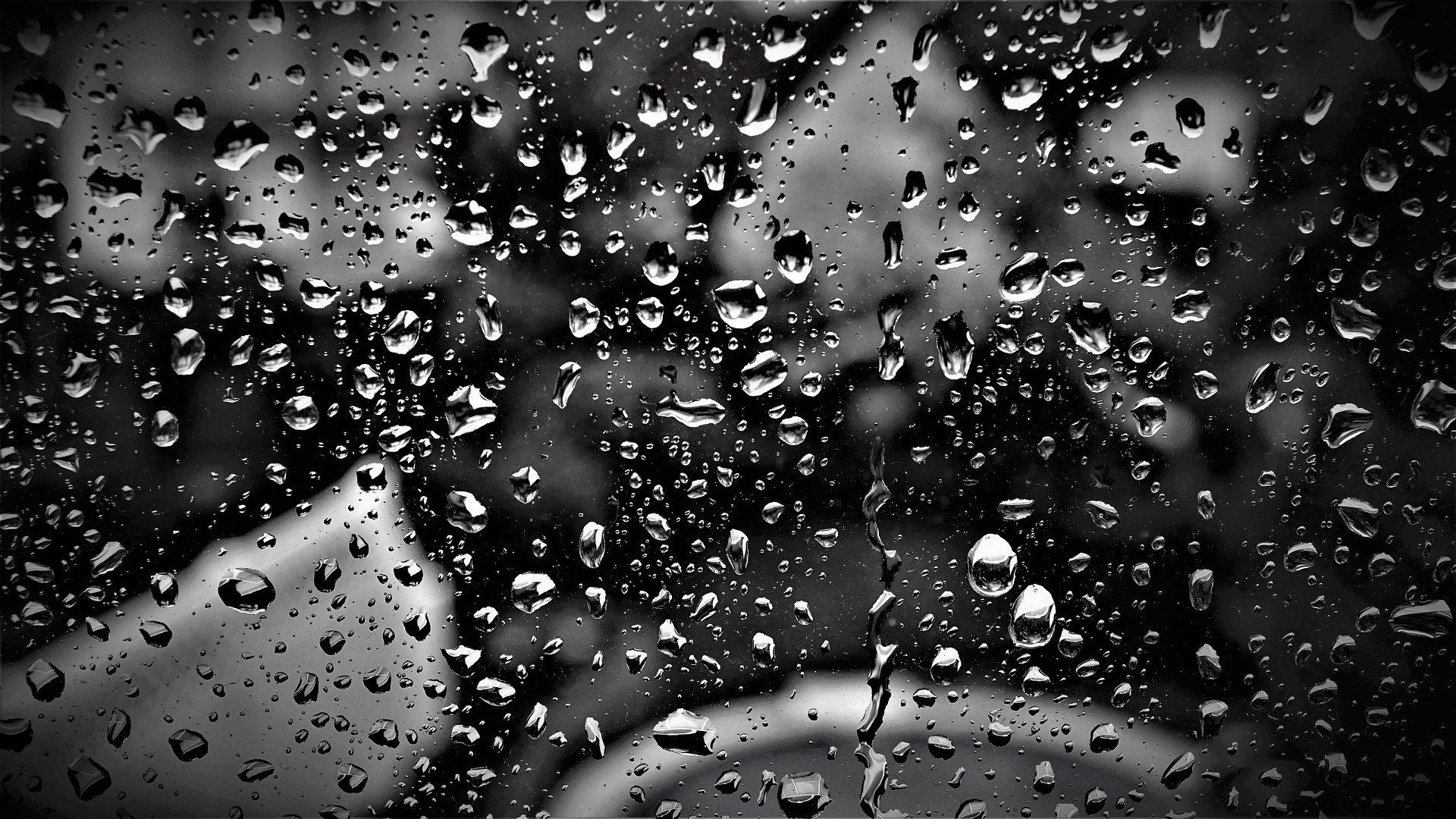 Water Drops on a Window with Black Background by Mylene2401