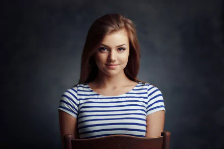 Portrait of a redhead woman with brown eyes wearing a striped shirt, captured in 4K Ultra HD quality for PC desktop wallpaper and background.