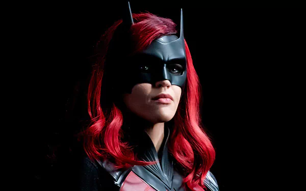 Portrait of an actress as Kate Kane/Batwoman in a black cowl and red hair, dramatic lighting — 4K Ultra HD TV show PC desktop wallpaper.