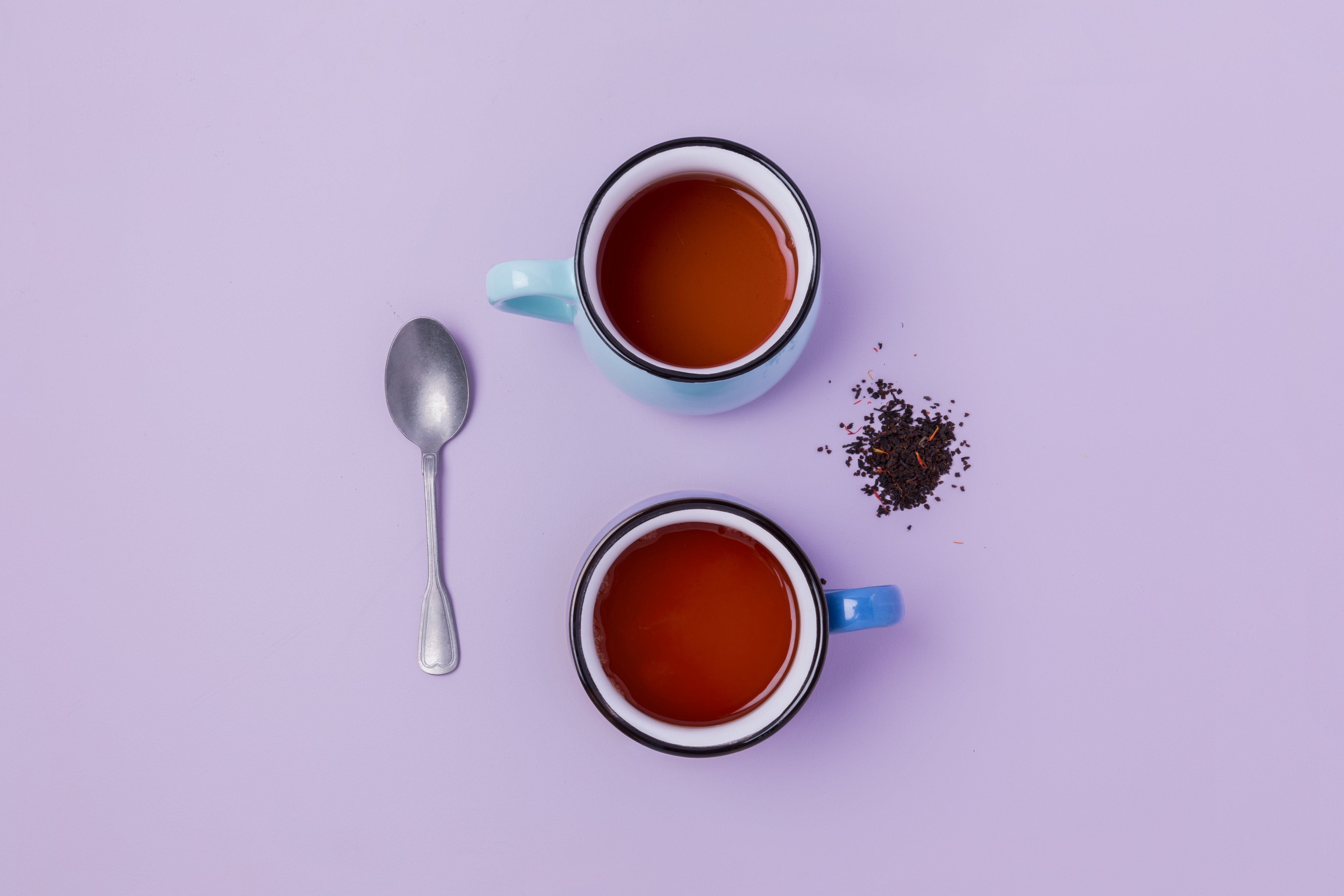 Loose Leaf Tea Brewed On Purple by Sarah Pflug