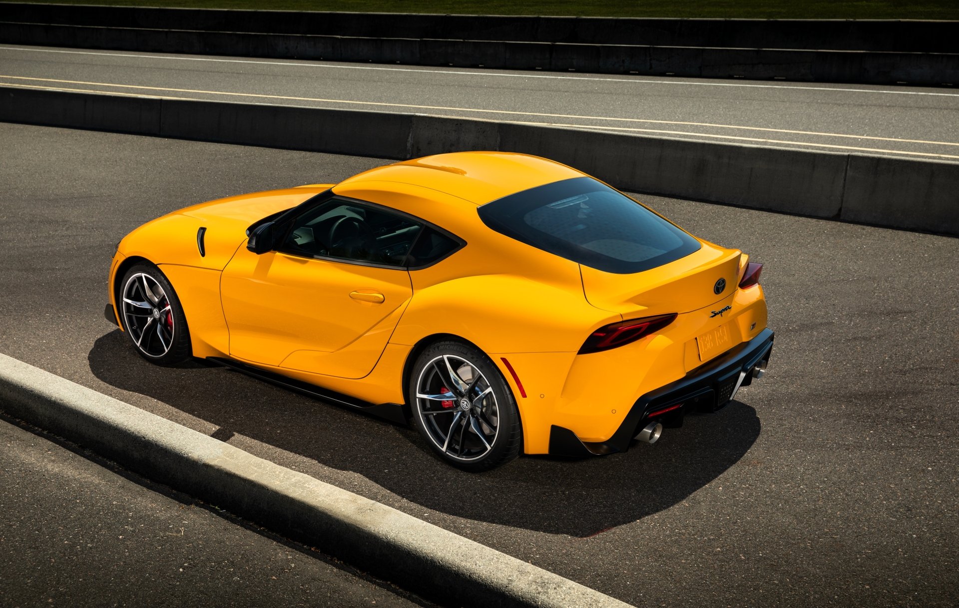 download-yellow-car-car-toyota-vehicle-toyota-gr-supra-4k-ultra-hd