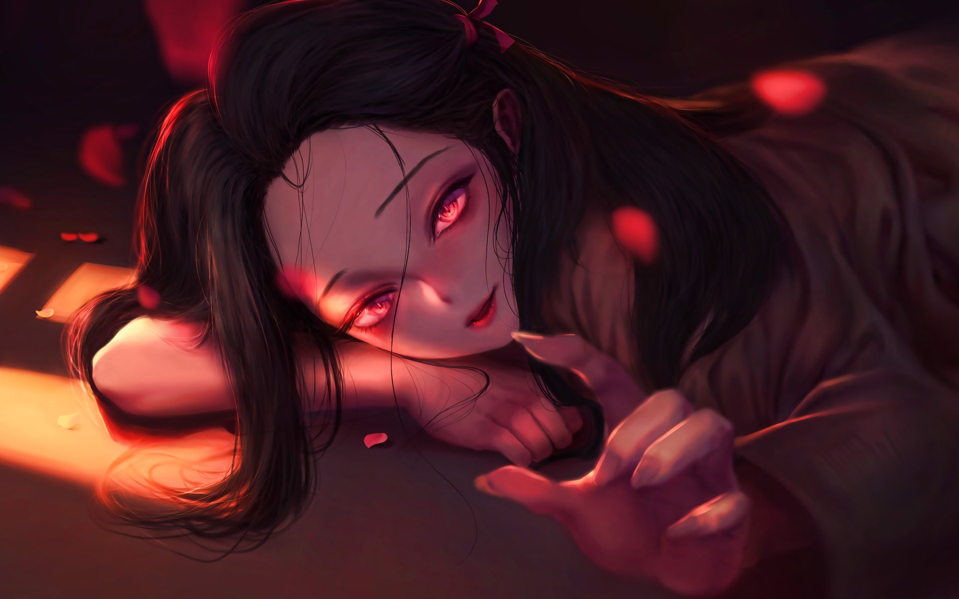 HD desktop wallpaper featuring Nezuko Kamado from the anime Demon Slayer: Kimetsu no Yaiba. Nezuko's enchanting gaze and delicate hand gestures are highlighted with a dark, moody background and red accents.