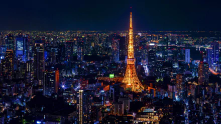 Nighttime Tokyo skyline with illuminated Tokyo Tower rising above city lights — HD PC desktop wallpaper/background of Japan's man-made urban landscape.
