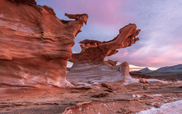 HD desktop wallpaper of a stunning Nevada canyon at sunset, showcasing unique rock formations and a vibrant sky in a natural desert landscape.