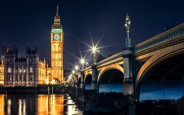 Night view of Big Ben and Westminster Bridge in London, captured as a vibrant HD PC desktop wallpaper background.