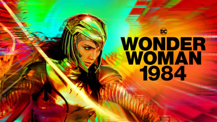HD PC desktop wallpaper featuring Wonder Woman from the movie Wonder Woman 1984 in golden armor, poised against a vivid red-green motion-blur background