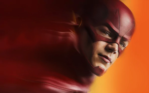 A HD desktop wallpaper featuring Barry Allen (Grant Gustin) as The Flash from the 2014 TV show The Flash, with a blurred, dynamic red and orange background.