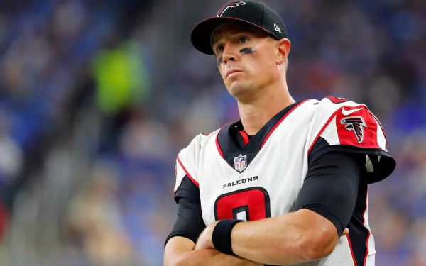 HD desktop wallpaper featuring Matt Ryan in an Atlanta Falcons uniform on the field.
