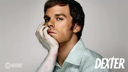 HD desktop wallpaper of a contemplative man in a light shirt resting his chin on his hand, with the Dexter logo and Showtime watermark in the corners.