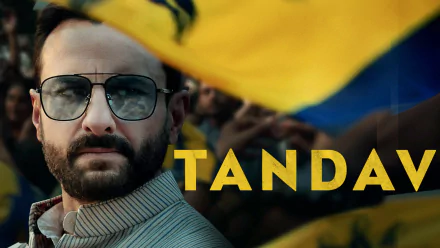 HD desktop wallpaper of a man in sunglasses with the word TANDAV overlaid, conveying a dramatic theme.