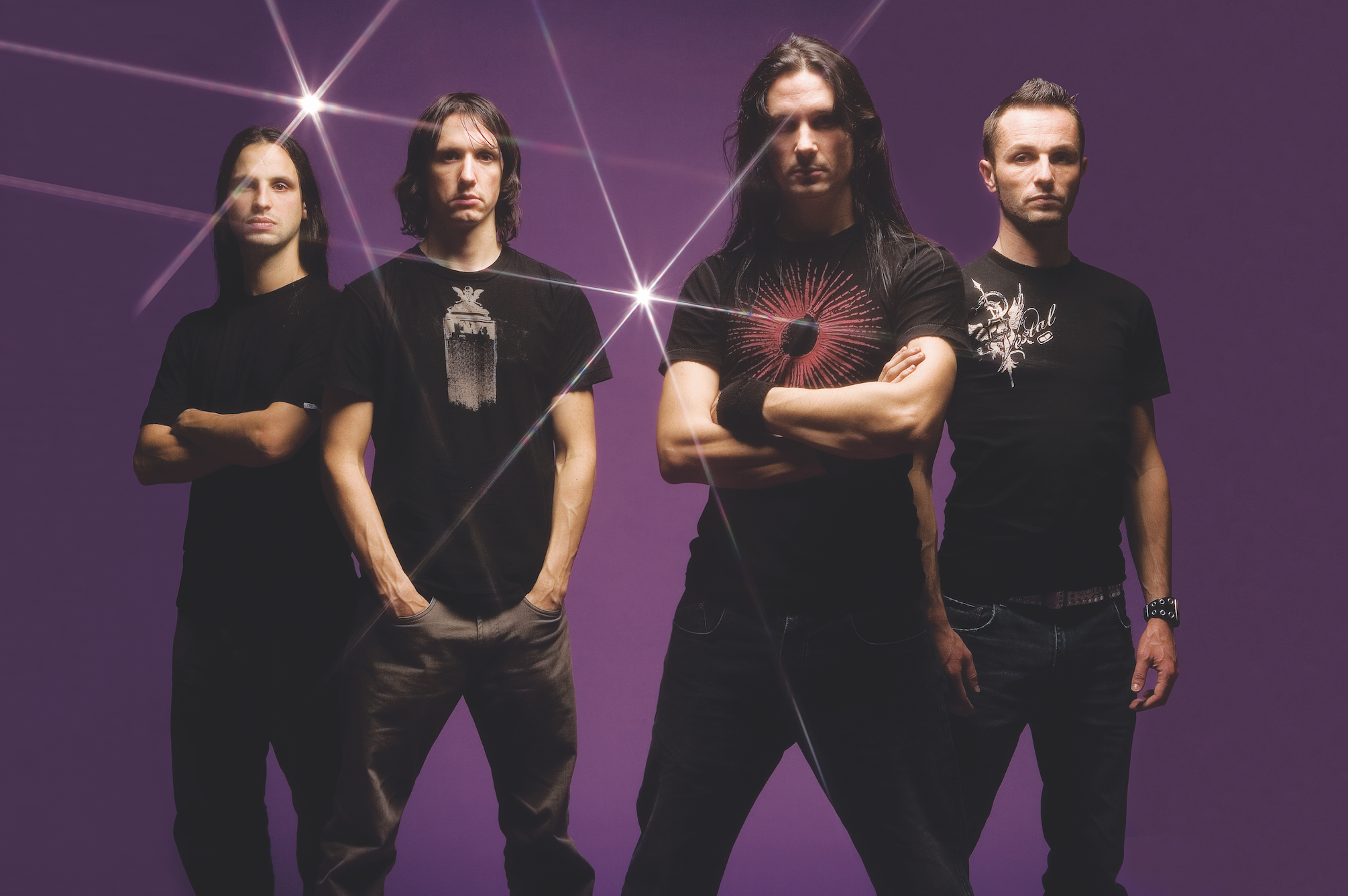 HD wallpaper featuring a group of four band members with a vibrant purple background, emphasizing a rock theme for a desktop background tagged with Gojira.