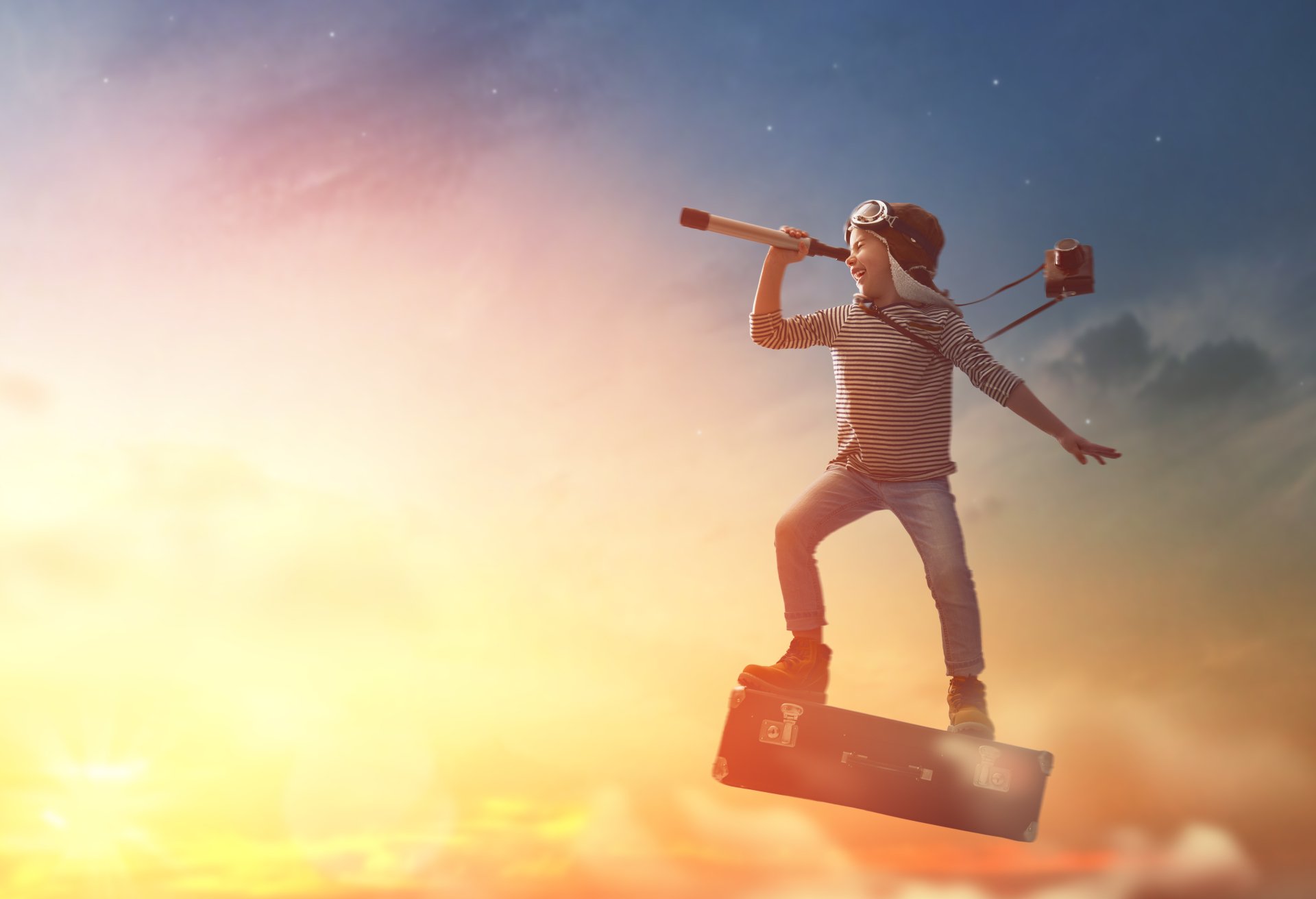 Child with telescope and wings on imagination adventure, HD desktop wallpaper.