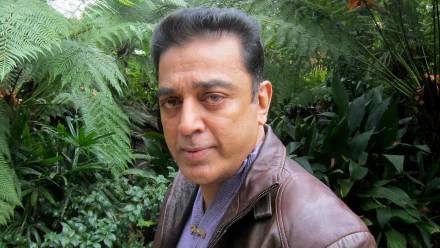 HD desktop wallpaper of a person with a leather jacket in a garden background.