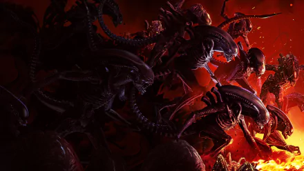 HD desktop wallpaper featuring intense action from the video game Aliens: Fireteam Elite, showcasing menacing aliens against a fiery red backdrop.
