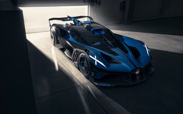 Sleek black and blue Bugatti Bolide supercar parked in a dimly lit garage, showcased as an 8K Ultra HD PC desktop wallpaper and background.