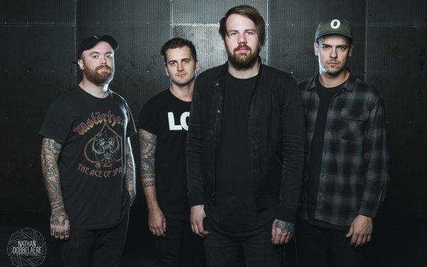 HD wallpaper of Beartooth band members posing together for a desktop background.
