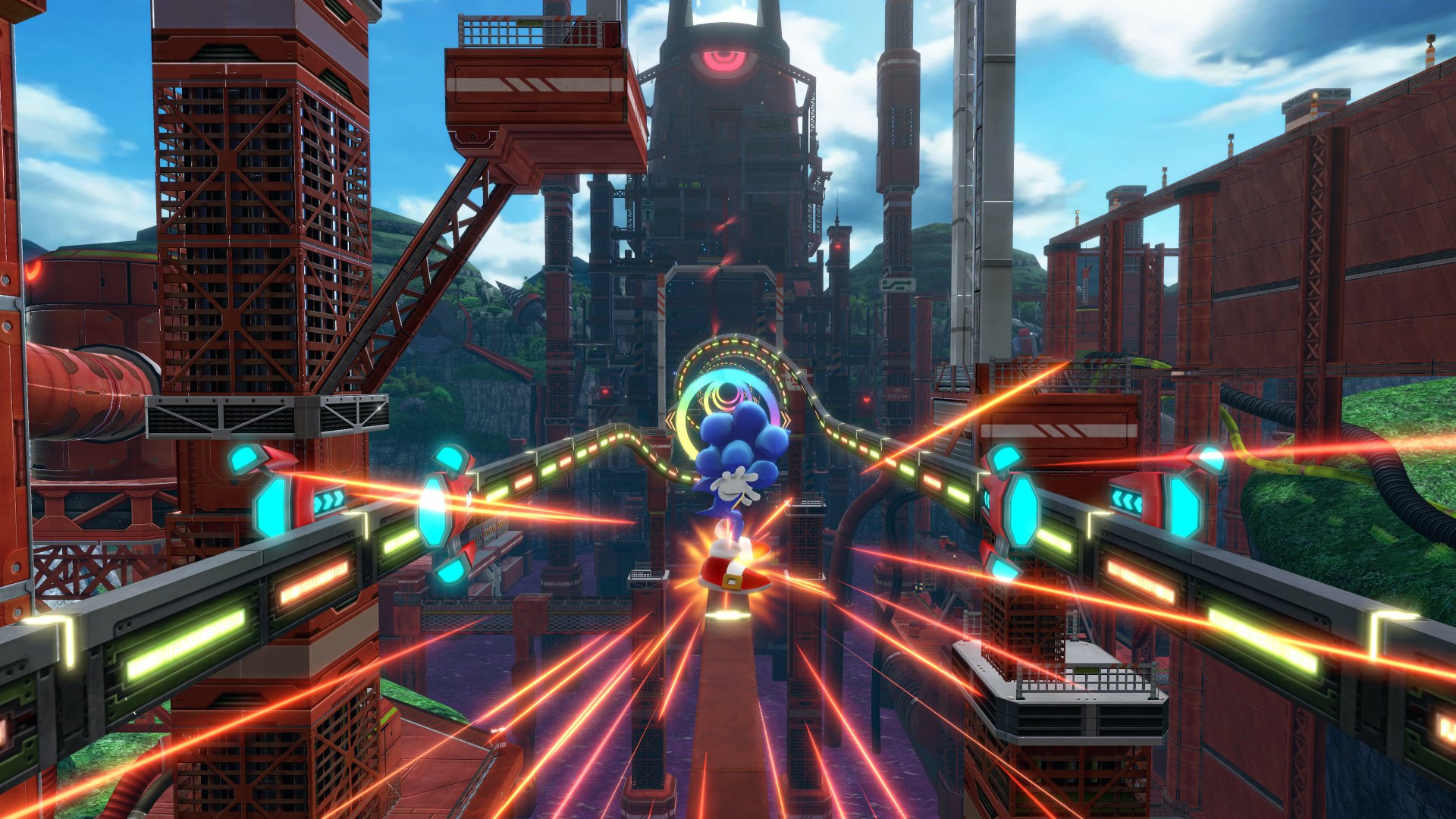A 4K Ultra HD PC desktop wallpaper featuring Sonic the Hedgehog racing through a vibrant, futuristic level from the video game Sonic Colors: Ultimate.
