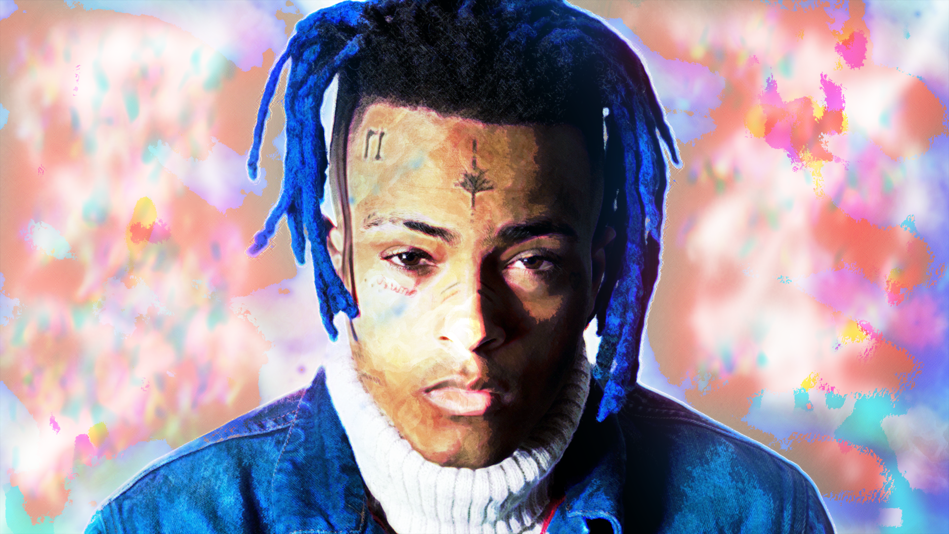 HD PC desktop wallpaper featuring a vibrant portrait of music artist XXXTentacion with colorful, abstract background elements.