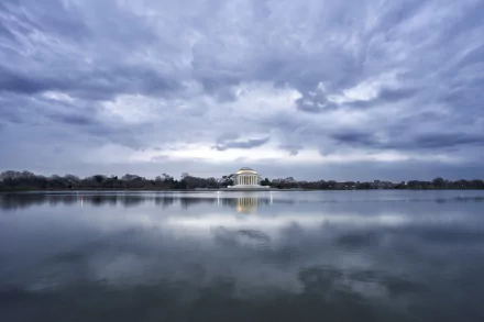  Cloudy Sunrise at the Jefferson Memorial by Angela Pan