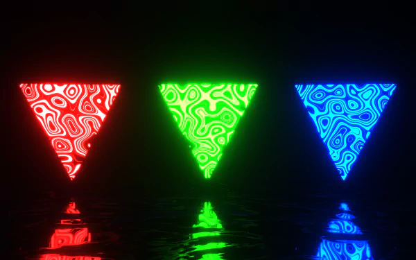 Vibrant HD desktop wallpaper featuring artistic, glowing triangles in red, green, and blue, set against a dark background with reflective surfaces.
