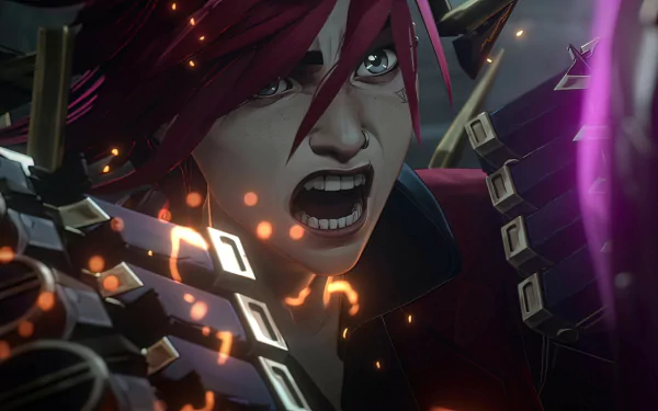 Close-up of VI from League of Legends, featured in the animated series Arcane. The character exhibits intense emotion with striking red hair and dynamic background effects.