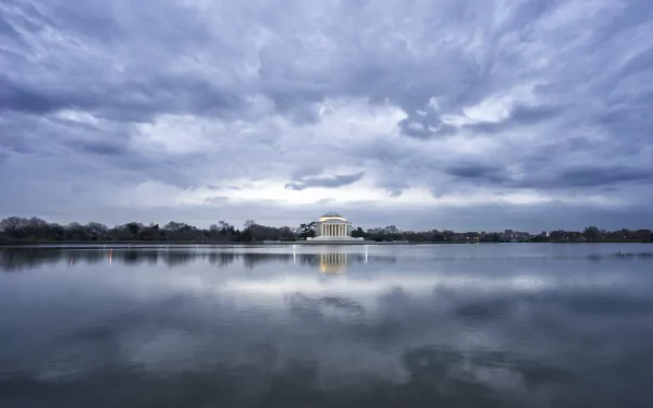  Cloudy Sunrise at the Jefferson Memorial by Angela Pan