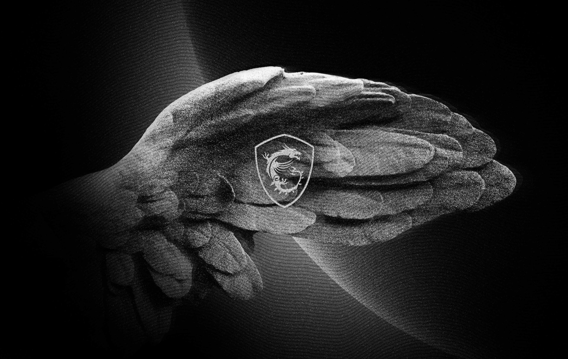 Monochrome 2K Quad HD PC wallpaper of a stone sculpted wing with MSI dragon shield logo, tech-inspired lighting and subtle curved light streaks.