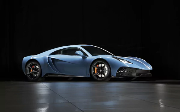 Blue Noble M500 supercar on a reflective floor against a black backdrop — 5K Ultra HD PC desktop wallpaper background.