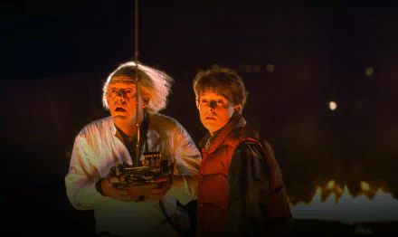 Christopher Lloyd Dr. Emmett Brown Michael J. Fox Marty McFly movie Back To The Future HD Desktop Wallpaper | Background Image