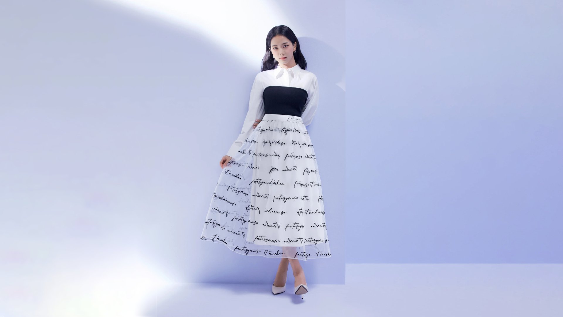 Jisoo from BlackPink poses elegantly in a monochrome outfit against a minimalist backdrop in this 4K Ultra HD music-themed desktop wallpaper.