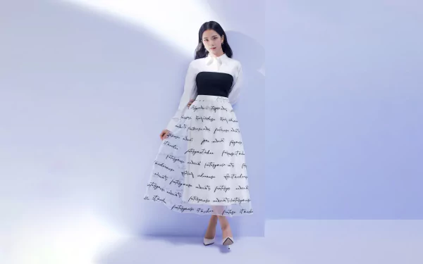 Jisoo from BlackPink poses elegantly in a monochrome outfit against a minimalist backdrop in this 4K Ultra HD music-themed desktop wallpaper.