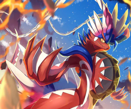 HD PC desktop wallpaper and background featuring Koraidon from the video game Pokémon: Scarlet and Violet — a vibrant, armored draconic Pokémon posed against a fiery, sky-filled backdrop.